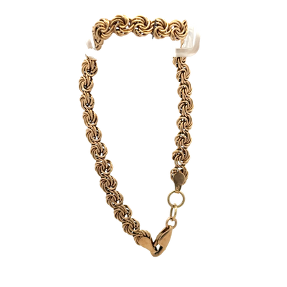 9ct yellow gold bracelet weighing 4.8g with intricate link design, crafted by Reeves and Sons.