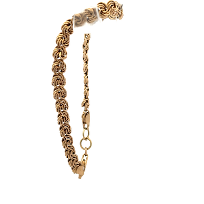 Reeves and Sons 9ct yellow gold bracelet weighing 4.8g, featuring a sleek, polished design with intricate chain links.