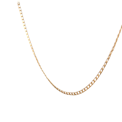 9ct yellow gold chain from Reeves and Sons, weighing 3.6g, showcasing a delicate and elegant jewelry piece against a neutral background.