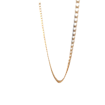 Reeves and Sons 9ct yellow gold chain weighing 3.6g, showcasing a detailed link design on a plain white background.