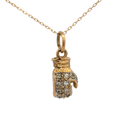 9ct yellow gold boxing glove pendant by Reeves and Sons, showcasing a detailed gold pendant with a weight of 5g on a plain background.