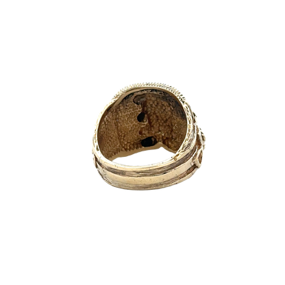 9ct yellow gold saddle ring size T1/2, featuring a smooth, polished band with subtle detailing, crafted by Reeves and Sons.
