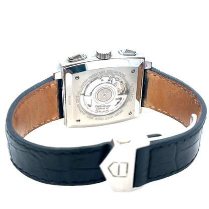 Tag Heuer Monaco automatic chronograph watch with silver dial and black leather strap, showcasing the luxury timepiece.