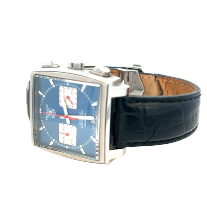 Reeves and Sons Tag Heuer Monaco automatic chronograph watch with black dial and silver case, detailed close-up image of the luxury timepiece.
