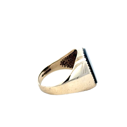 9ct yellow gold signet ring in size P with engraved face, crafted by Reeves and Sons, displayed on a neutral background.