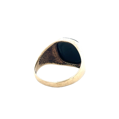 9ct yellow gold signet ring with a polished finish, size P, by Reeves and Sons, displayed on a plain background.