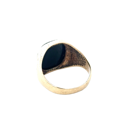 9ct yellow gold signet ring in size P by Reeves and Sons, featuring a smooth, polished surface and classic design.