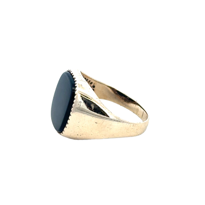 9ct yellow gold signet ring in size P by Reeves and Sons, featuring a smooth polished surface and classic design.