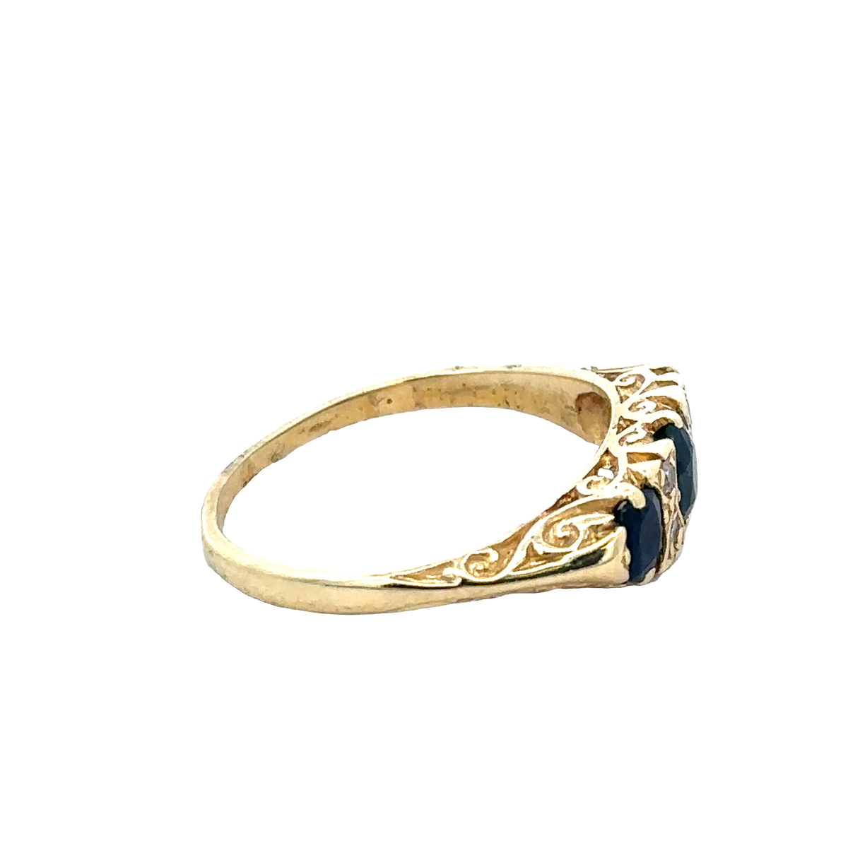 Elegant 18ct sapphire and diamond ring in size M by Reeves and Sons, showcasing a sparkling gemstone design.