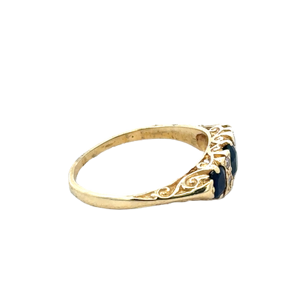 Elegant 18ct sapphire and diamond ring in size M by Reeves and Sons, showcasing a sparkling gemstone design.
