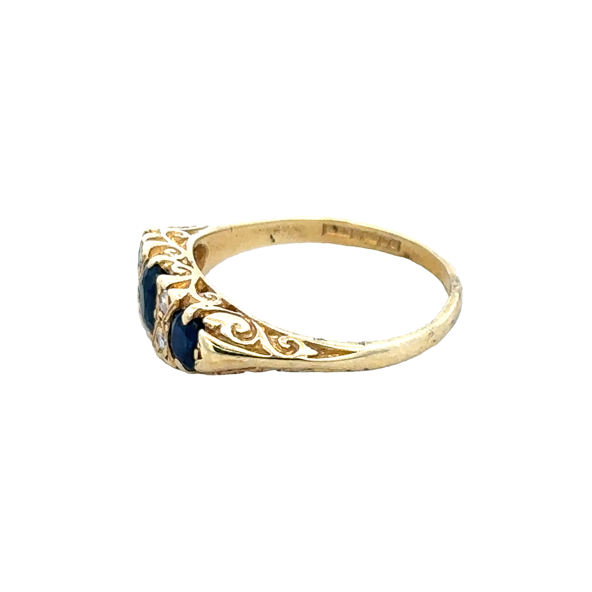 18ct sapphire and diamond ring by Reeves and Sons, size M, featuring a central sapphire gemstone with diamond accents.