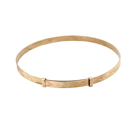 9ct yellow gold baby bangle from Reeves and Sons, delicate jewelry piece weighing 1.8g, designed for infants or young children.