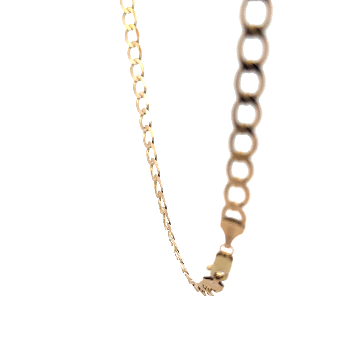 Reeves and Sons 9ct yellow gold curb chain, 15.9g, showing close-up of linked gold chain with detailed texture and shine.