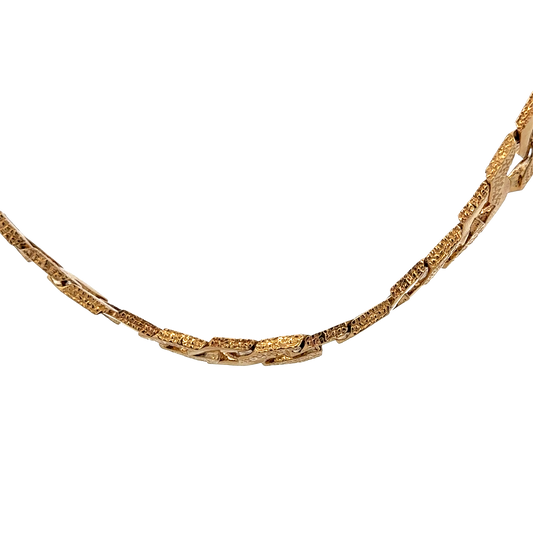 9ct yellow gold chain by Reeves and Sons, 117.6g, displayed on a plain background