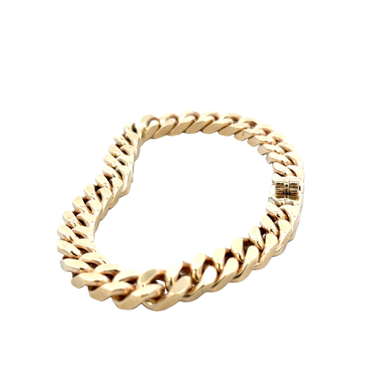 9ct yellow gold curb bracelet by Reeves and Sons, 53.4g weight, featuring polished interlocking links