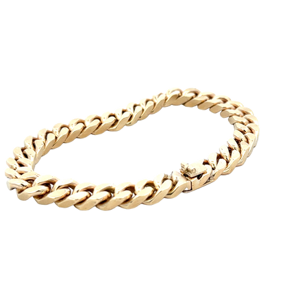 9ct yellow gold curb bracelet by Reeves and Sons, 53.4g, shown against a plain background