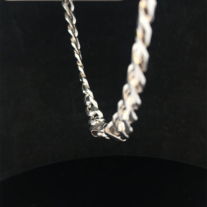 Reeves and Sons silver curb chain, 108.1g, close-up view of polished interlocking links