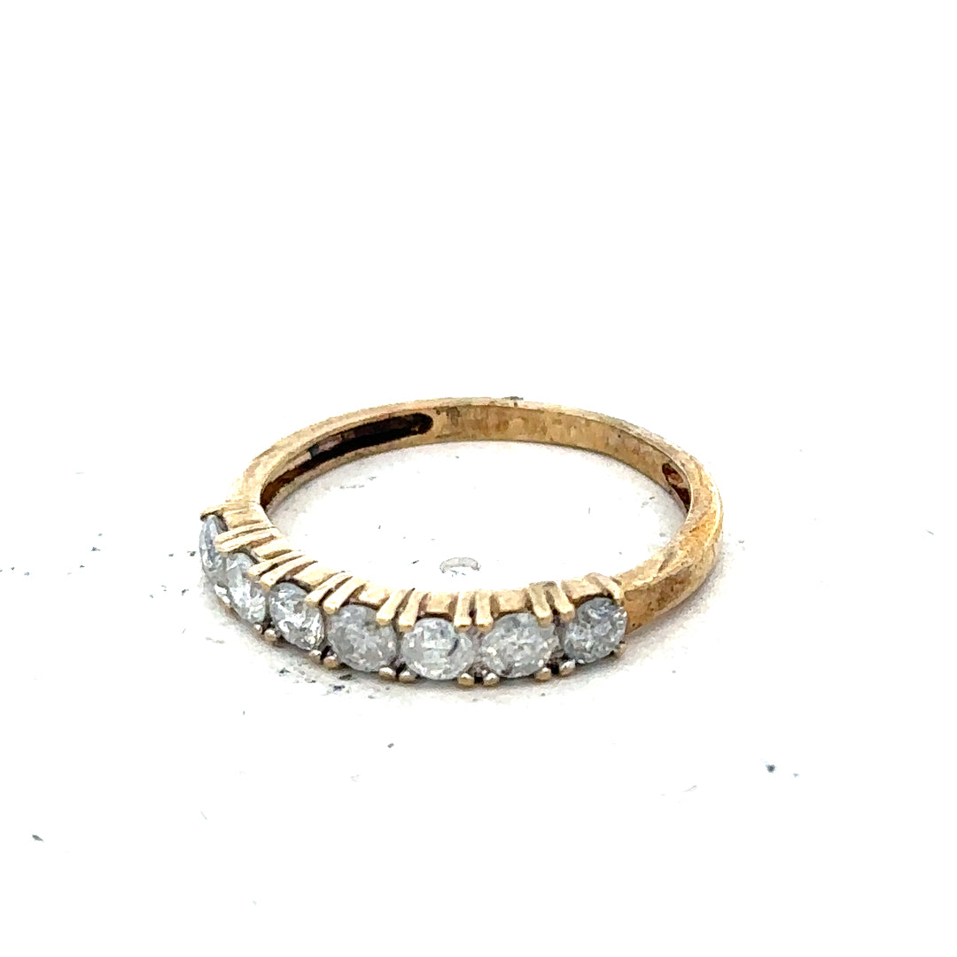 9ct half-carat diamond eternity ring by Carat with a continuous row of sparkling diamonds set in a sleek band.