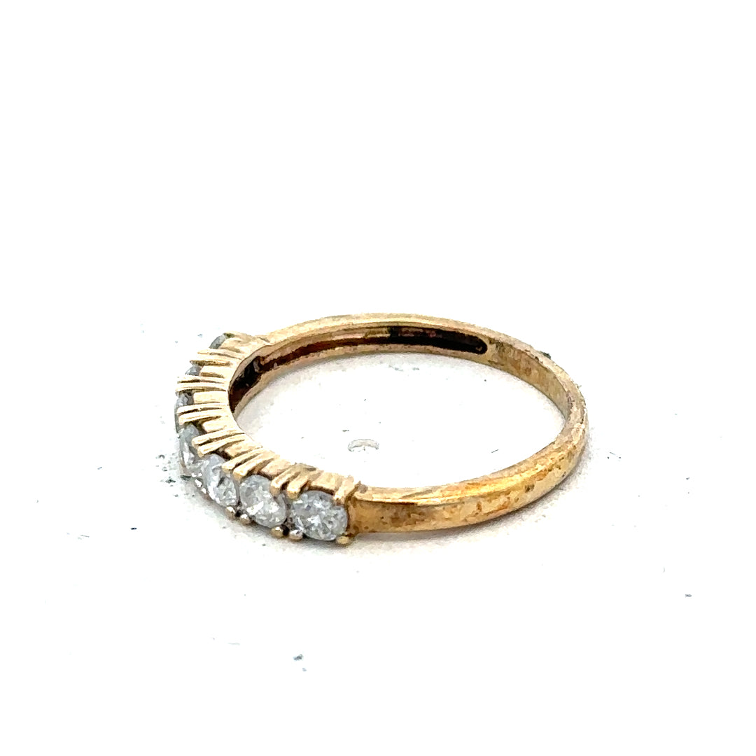 9ct half-carat diamond eternity ring by Carat featuring a continuous row of sparkling diamonds set in a sleek band.