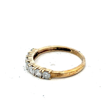 9ct half-carat diamond eternity ring by Carat featuring a continuous row of sparkling diamonds set in a sleek band.