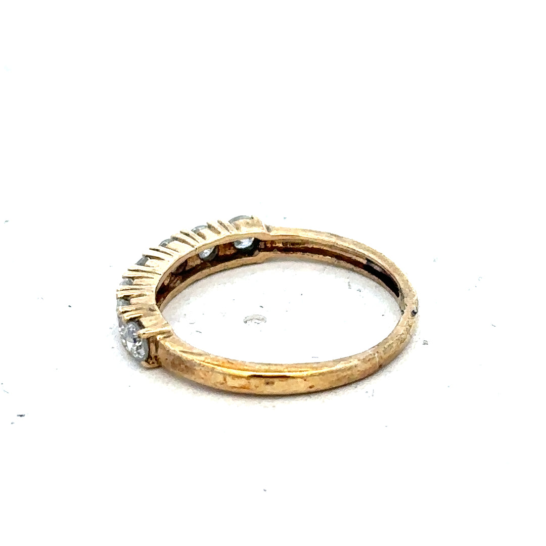 9ct gold diamond eternity ring with half-carat total weight, featuring a continuous row of sparkling diamonds by Carat.