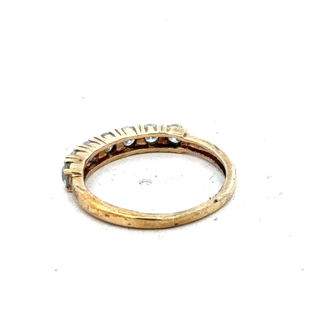 9ct half-carat diamond eternity ring by Carat featuring sparkling diamonds set in a continuous band of gold.