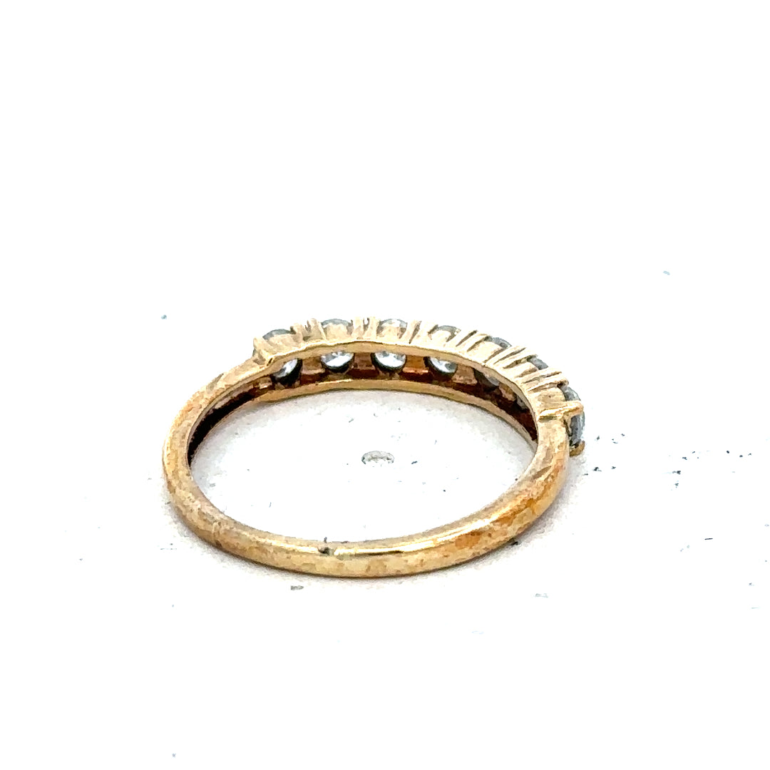 9ct half-carat diamond eternity ring by Carat, featuring a continuous row of sparkling diamonds on a sleek band.