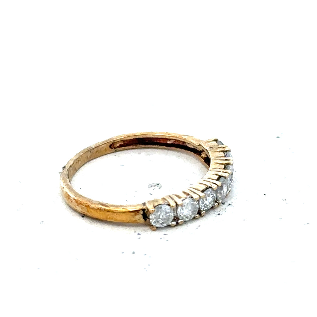 9ct gold diamond eternity ring by Carat featuring half-carat set diamonds in a continuous band.