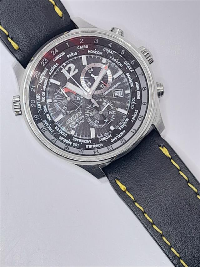 Citizen WR100 Eco-Drive watch model SH24922B displaying a sleek silver dial and stainless steel band.