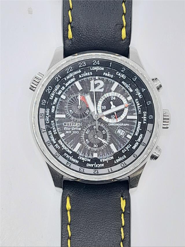 Citizen WR100 Eco-Drive watch model SH24922B with stainless steel band and black dial, showcasing a sleek, durable design.