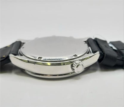 Citizen WR100 Eco-Drive watch SH24922B with stainless steel band, black dial, and date display.