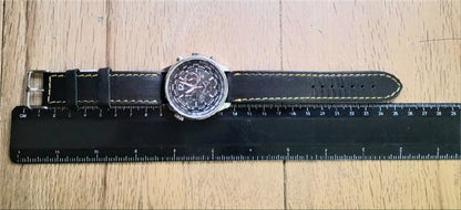 Citizen WR100 Eco-Drive watch model SH24922B with stainless steel band and black dial, displayed on a neutral background.