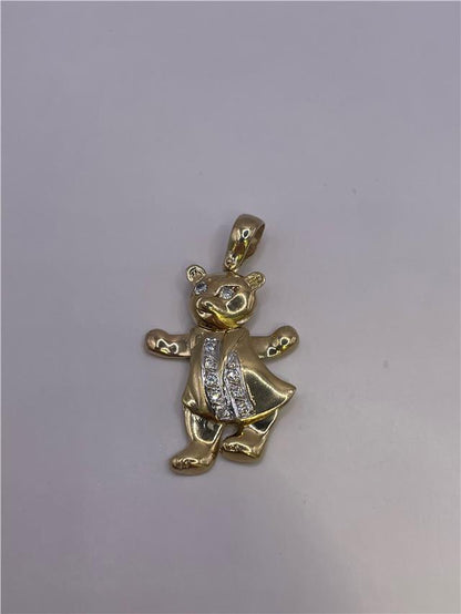 9ct gold pendant weighing 8.9g, displayed with intricate design and polished finish, ideal for elegant jewelry collection.