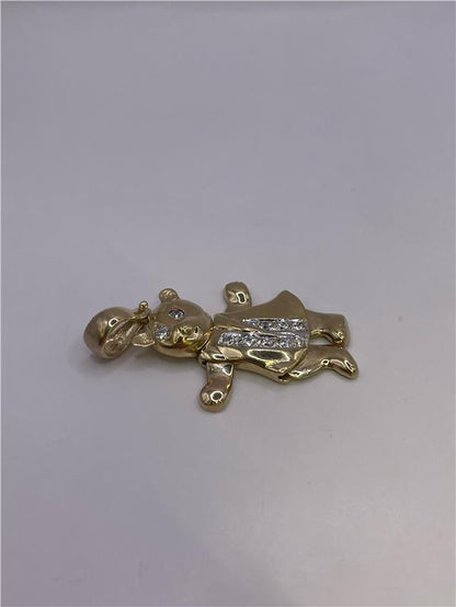 9ct gold pendant weighing 8.9g displayed with intricate design and polished finish, showcasing fine craftsmanship.