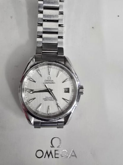Omega Seamaster Aqua Terra Co-Aaxial watch full set with stainless steel bracelet and blue dial, displayed in an elegant presentation box.