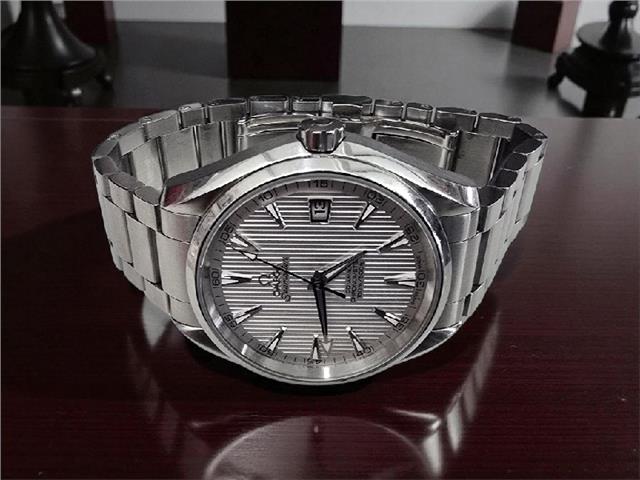 Omega Seamaster Aqua Terra Co-Axial watch with full set, showing stainless steel case, blue dial, and bracelet.