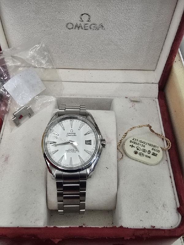 Omega Seamaster Aqua Terra Co-Axial watch with full set, featuring a stainless steel bracelet and elegant dial display.