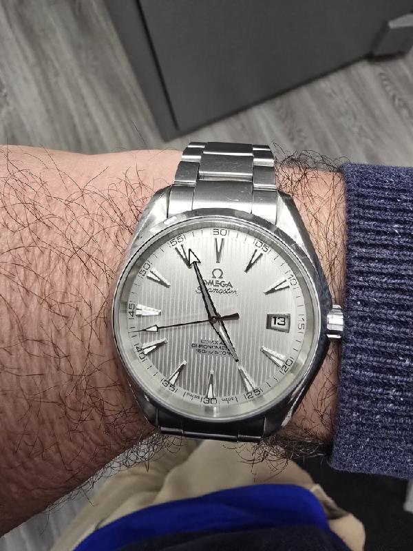 Omega Seamaster Aqua Terra Co-Axial watch with full set, featuring a stainless steel bracelet and classic dial display.