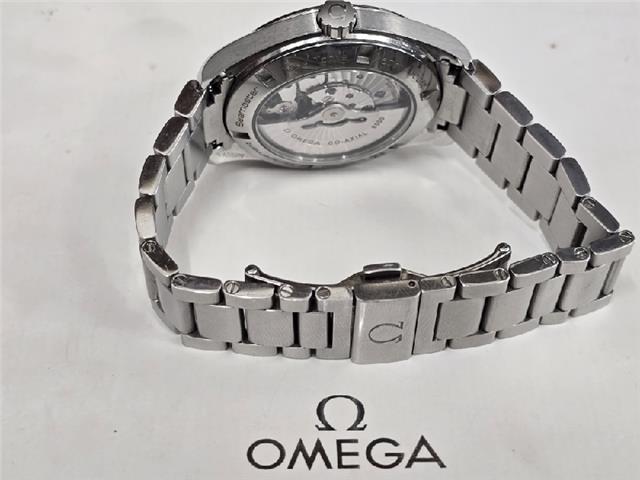 Omega Seamaster Aqua Terra Co-Axial watch with full set, featuring a stainless steel case, blue dial, and matching bracelet.