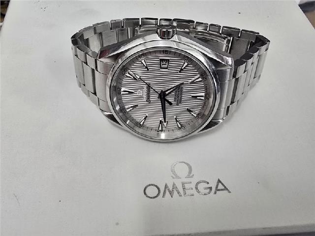 Omega Seamaster Aqua Terra Co-Axial watch with full set, featuring a stainless steel case, blue dial, and bracelet.