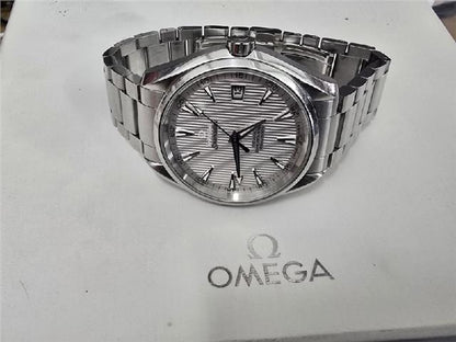 Omega Seamaster Aqua Terra Co-Axial watch with full set, featuring a stainless steel case, blue dial, and bracelet.