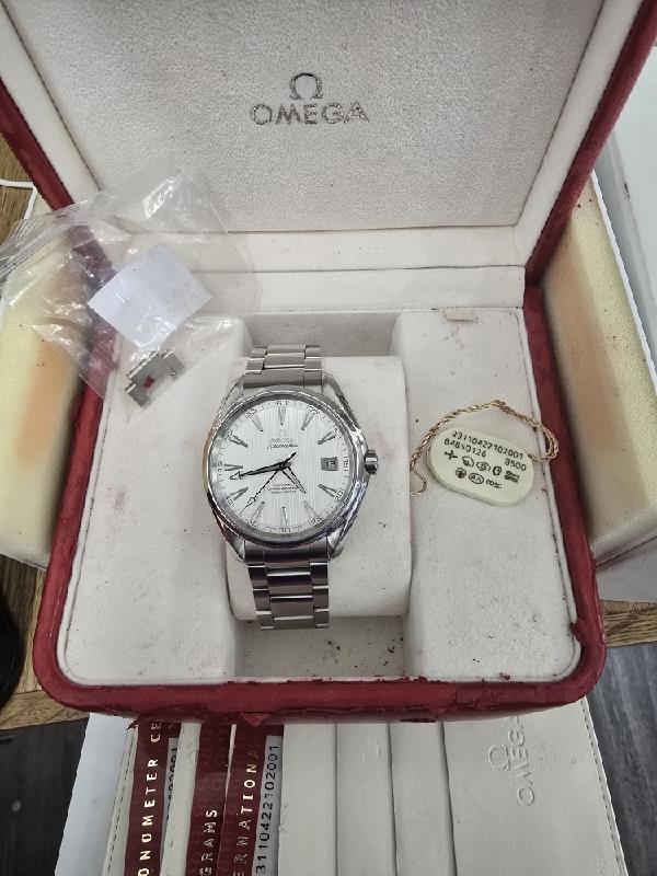 Omega Seamaster Aqua Terra Co-Axial watch full set with stainless steel bracelet, blue dial, and date display.