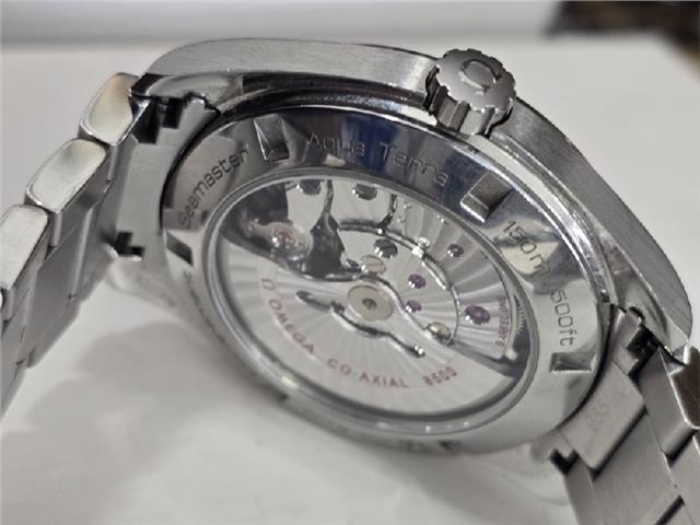 Omega Seamaster Aqua Terra Co-Axial watch with full set, featuring a stainless steel case, blue dial, and matching bracelet.