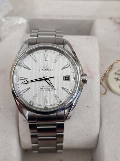 Omega Seamaster Aqua Terra co-axial watch with full set, featuring stainless steel case, blue dial, and bracelet.