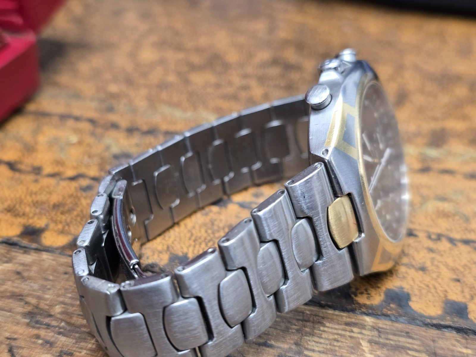 Omega Seamaster Polaris Chronograph watch with boxed packaging and card, featuring a stainless steel case and black dial.