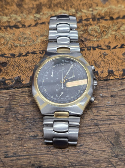 Omega Seamaster Polaris Chronograph watch with box and card, featuring a stainless steel case and black dial.