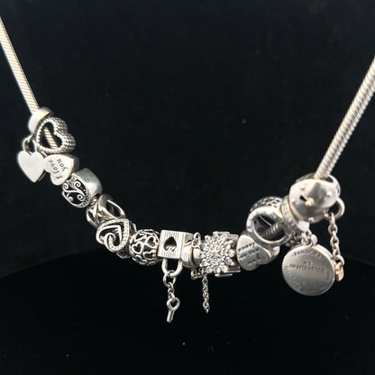 Pandora charm necklace, 20-inch silver chain with decorative charms, stylish jewelry accessory