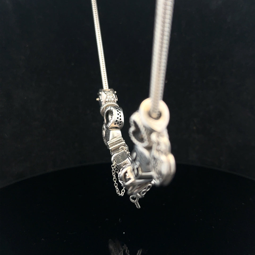 PANDORA 20-inch charm necklace with delicate silver chain and subtle charm accents, designed for elegant jewelry wear.