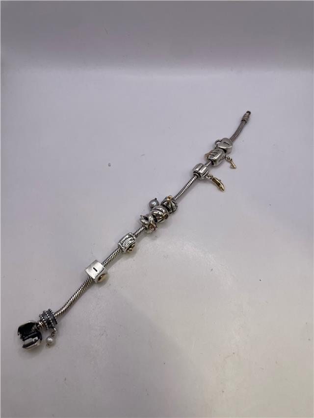 Silver Pandora bracelet with intricate chain links, weighing 42.3 grams, featuring a sleek and stylish design.