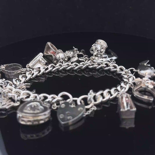 Silver charm bracelet 67.4g (sh25533l)